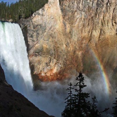 A double rainbow in the spray of Lower Yellowstone Falls in Yellowstone National Park in Wyoming.